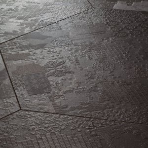 Piso de grés Déchirer da Mutina com relevo efeito betão