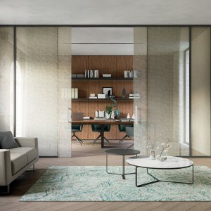 Sala de reuniões delimitada por divisórias de vidro Quadrifoglio