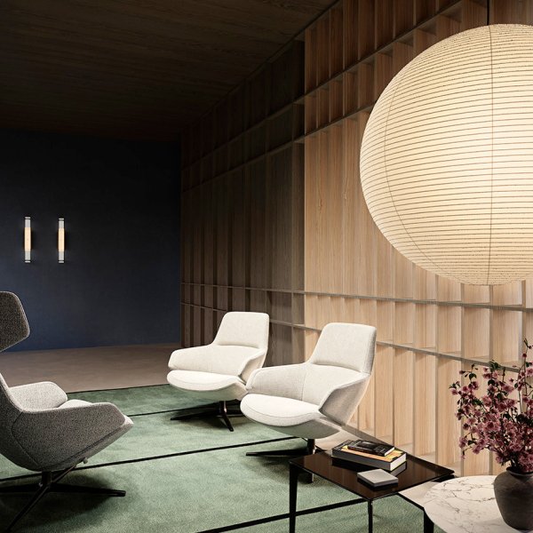 Lounge de empresa com poltronas e assentos de design Arper